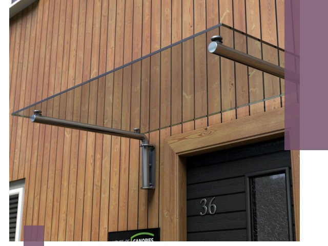 Стеклянные козырьки на входы и фасады в Каспийске